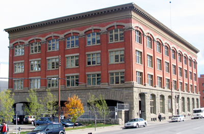 The Customs Examining Warehouse has been repurposed for office use.  It's now home to architecture and design firms.